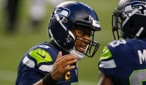 Seattle Seahawks quarterback Russell Wilson (3) reacts after throwing a touchdown pass against the New England Patriots during the third quarter at CenturyLink Field.